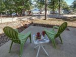 Just off the front porch is a cement patio, perfect for morning coffee outside wit a lake view.